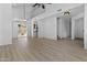 Bright, open living room with vaulted ceilings, wood-style floors, and a loft view, perfect for modern living at 4182 W Park Ave, Chandler, AZ 85226