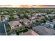 Scenic aerial shot showcasing houses with pools and lush greenery, capturing the community's serene atmosphere at 4206 E Blue Ridge Pl, Chandler, AZ 85249