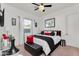 Stylish bedroom features a decorative ceiling fan and ample natural light from a large window at 4206 E Blue Ridge Pl, Chandler, AZ 85249