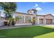 Attractive home with desert landscaping, a three-car garage, and an eye-catching turret design at 4206 E Blue Ridge Pl, Chandler, AZ 85249