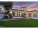 Charming home featuring manicured lawn, desert landscaping and a unique turret architectural detail at 4206 E Blue Ridge Pl, Chandler, AZ 85249