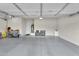 This garage has epoxy floors, storage cabinets and a water heater at 4206 E Blue Ridge Pl, Chandler, AZ 85249