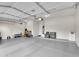 Spacious and clean two-car garage with epoxy flooring and ample storage space at 4206 E Blue Ridge Pl, Chandler, AZ 85249