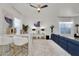 Bright and modern living room with ample seating, stylish decor, and contemporary artwork at 4206 E Blue Ridge Pl, Chandler, AZ 85249
