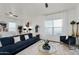 Comfortable living room featuring plush seating, stylish decor, and ample natural light at 4206 E Blue Ridge Pl, Chandler, AZ 85249