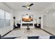Living room featuring modern fireplace, neutral rug, and comfortable seating at 4206 E Blue Ridge Pl, Chandler, AZ 85249