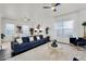 Open-concept living room with stylish furnishings and plenty of space for entertaining at 4206 E Blue Ridge Pl, Chandler, AZ 85249