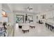 Open living area with patio access, modern furnishings, and bright white walls at 4206 E Blue Ridge Pl, Chandler, AZ 85249