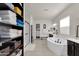 Spacious main bathroom featuring a walk-in shower, soaking tub and custom storage at 4206 E Blue Ridge Pl, Chandler, AZ 85249