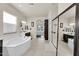 Gorgeous main bathroom featuring a soaking tub, walk-in shower and custom cabinetry at 4206 E Blue Ridge Pl, Chandler, AZ 85249
