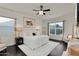 Relaxing main bedroom with dark hardwood floors, ceiling fan and large windows at 4206 E Blue Ridge Pl, Chandler, AZ 85249