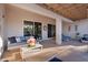 Stylish covered patio with cozy seating, ideal for outdoor gatherings and enjoying the fresh air at 4206 E Blue Ridge Pl, Chandler, AZ 85249