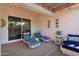 Serene outdoor patio with lounge chairs and a covered area, creating an inviting space for relaxation at 4206 E Blue Ridge Pl, Chandler, AZ 85249