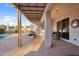 Charming covered patio offers outdoor seating with a view of the pool and manicured landscape at 4206 E Blue Ridge Pl, Chandler, AZ 85249