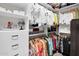 Well-organized walk-in closet with custom shelving, drawers, and abundant hanging space at 4206 E Blue Ridge Pl, Chandler, AZ 85249