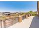 Balcony view showcasing beautiful desert landscape with mountain views, a pool, and neighborhood views at 4418 W Yoosooni Dr, New River, AZ 85087