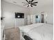 Spacious main bedroom with a large bed and walk in closet at 4418 W Yoosooni Dr, New River, AZ 85087