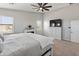 Relaxing main bedroom featuring a TV, vaulted ceiling, and cozy carpet at 4418 W Yoosooni Dr, New River, AZ 85087