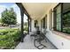Inviting front porch with comfortable seating, offering a relaxing outdoor space at 4901 E Amelia Ave, Phoenix, AZ 85018