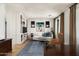 Comfortable living room featuring built-in shelving, modern decor, and an inviting atmosphere at 4901 E Amelia Ave, Phoenix, AZ 85018