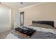 Comfortable bedroom with neutral walls, carpet, and view to doorway at 5018 W Wikieup Ln, Glendale, AZ 85308