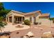 Large backyard with a covered patio, desert landscaping, and private pool at 5102 S Peachwood Dr, Gilbert, AZ 85298