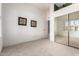 Bright bedroom with mirrored closets, neutral carpet, and natural lighting at 5102 S Peachwood Dr, Gilbert, AZ 85298