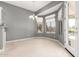 Cozy dining area with tile flooring, chandelier, and windows with outside views at 5102 S Peachwood Dr, Gilbert, AZ 85298