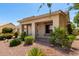 Inviting front porch with lush landscaping adds charm to this lovely home at 5102 S Peachwood Dr, Gilbert, AZ 85298