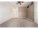 Neutral main bedroom with carpet flooring and high architectural shelving at 5102 S Peachwood Dr, Gilbert, AZ 85298