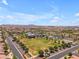 Expansive aerial view showcasing a well-planned community, with green spaces and amenities in the Arizona landscape at 5637 S Parrish --, Mesa, AZ 85212