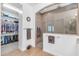 Bathroom featuring a walk-in shower, neutral colors, and a spacious walk in closet at 5637 S Parrish --, Mesa, AZ 85212