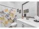 Well-lit bathroom with a shower/tub combo and vanity with storage at 5637 S Parrish --, Mesa, AZ 85212