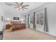 Bedroom with a wood frame bed, two side tables with lamps, and shuttered windows at 5637 S Parrish --, Mesa, AZ 85212