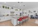 Spacious kitchen features a large island with barstool seating and stainless steel appliances at 5637 S Parrish --, Mesa, AZ 85212