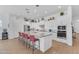 Spacious kitchen features a large island with barstool seating and stainless steel appliances at 5637 S Parrish --, Mesa, AZ 85212