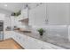 A kitchen featuring white cabinets, stainless steel appliances, and granite countertops at 5637 S Parrish --, Mesa, AZ 85212