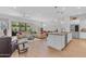 Open-concept living space with an island and a seamless connection to the outdoors at 5637 S Parrish --, Mesa, AZ 85212