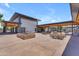 Open-air courtyard with a modern fire pit and outdoor seating area, perfect for gatherings at 5637 S Parrish --, Mesa, AZ 85212