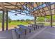 Well-maintained picnic pavilion featuring multiple tables, perfect for community gatherings and outdoor dining at 5637 S Parrish --, Mesa, AZ 85212