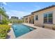 Inviting backyard pool with covered patio, providing a perfect oasis for relaxation and entertainment at 5637 S Parrish --, Mesa, AZ 85212