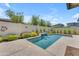 Beautiful private pool with waterfall feature and desert landscaping in a well-maintained backyard at 5637 S Parrish --, Mesa, AZ 85212