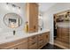 The bathroom offers a large vanity with double sinks and linen storage at 718 E Devon Dr, Gilbert, AZ 85296