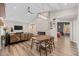 The living space features an electric fireplace with stone surround and an adjacent bedroom at 718 E Devon Dr, Gilbert, AZ 85296