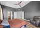 Another view of the main bedroom featuring a seating area and en suite bathroom at 718 E Devon Dr, Gilbert, AZ 85296