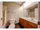 Comfortable bathroom with a vanity, a toilet, and a mirror at 747 S Extension Rd # 115, Mesa, AZ 85210