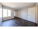 Inviting bedroom with hardwood floors and a window at 747 S Extension Rd # 115, Mesa, AZ 85210