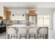 Modern kitchen boasts stainless steel appliances, pendant lighting, and quartz countertops at 7620 N 12Th Pl, Phoenix, AZ 85020
