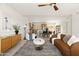 Open-concept living and dining area with modern decor and abundant natural light at 7620 N 12Th Pl, Phoenix, AZ 85020