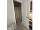 Spacious walk-in closet with built-in shelving and plush carpeted flooring at 7807 E Main St # Cc-98, Mesa, AZ 85207